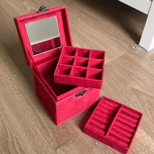 Multi-layer jewelry box with a handle